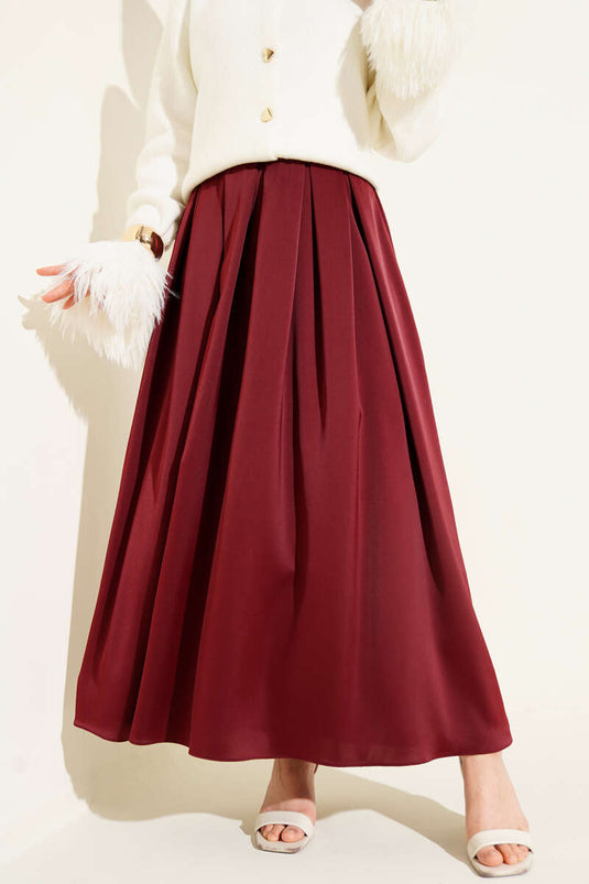 Jupe en satin large plissée bordeaux