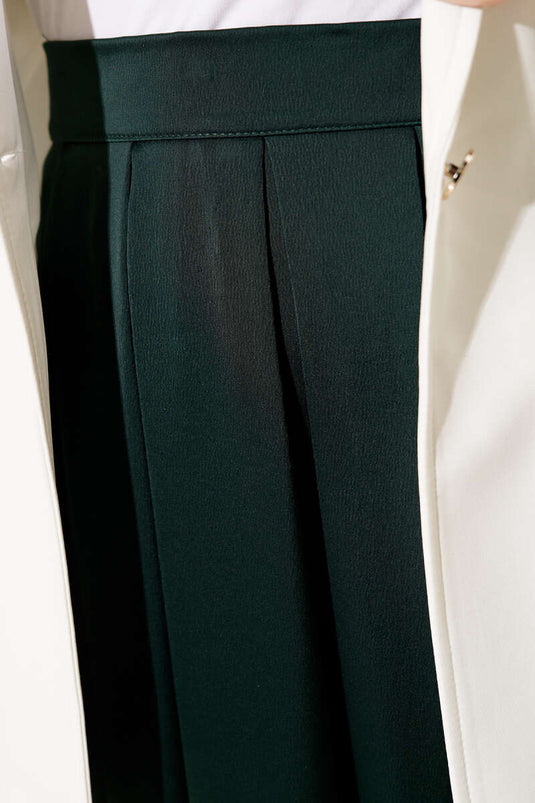 Jupe en satin large plissée émeraude