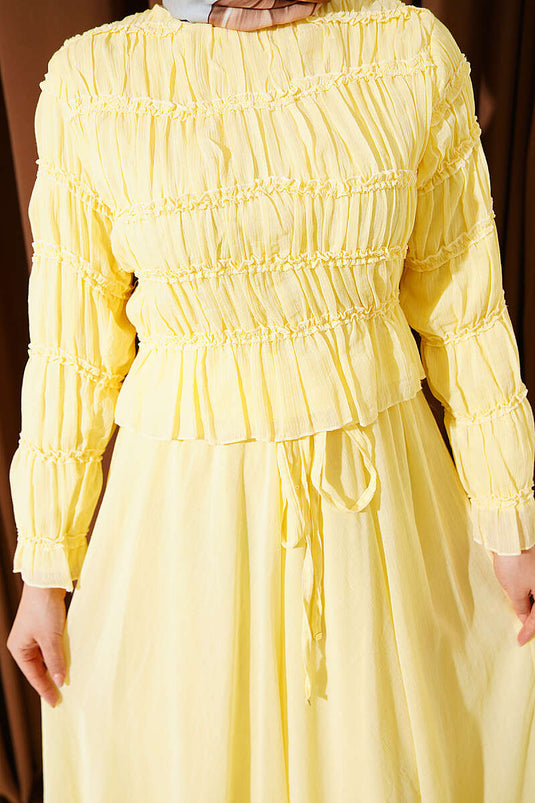Ensemble deux pièces Gipeli avec blouse et jupe jaune
