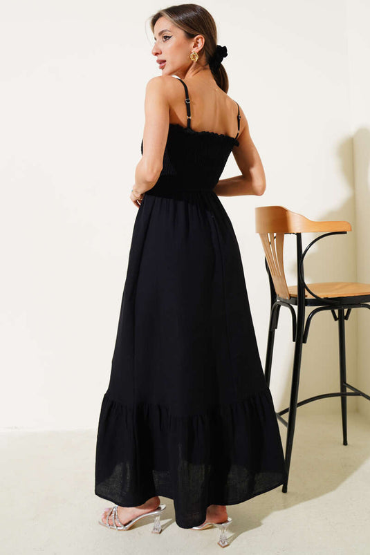 Schwarzes Musselinkleid mit Seilriemen von Gipel