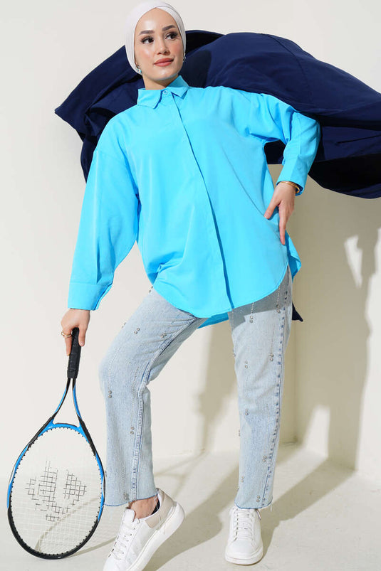 قميص أساسي بأزرار مخفية باللون الأزرق