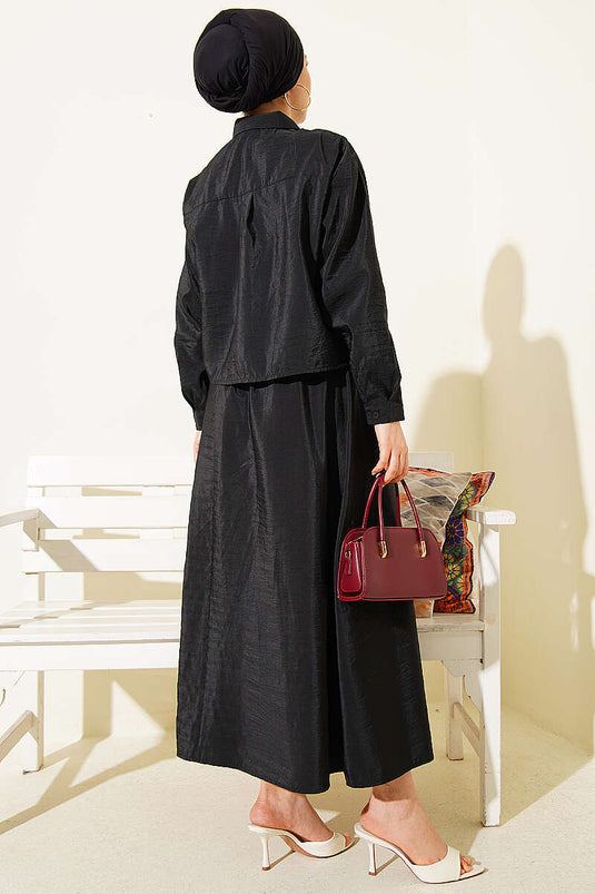 Ensemble deux pièces jupe et blouse à boutons cachés noir