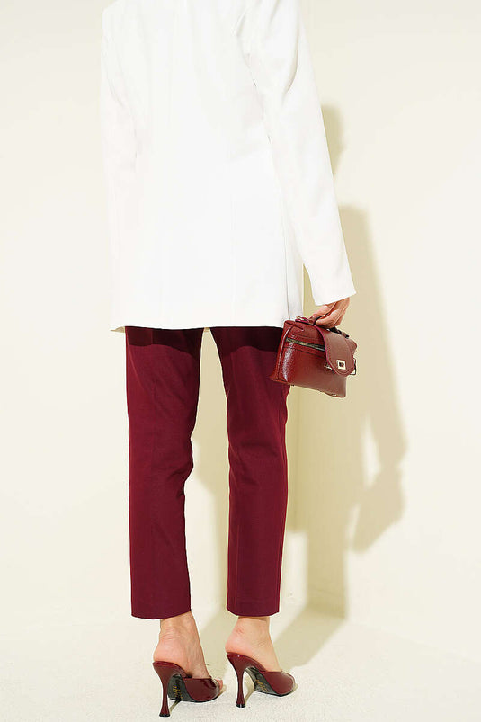 Pantalon slim bordeaux à fermeture éclair cachée