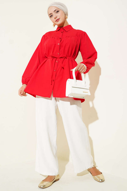 قميص أحمر بكسرات عند الصدر