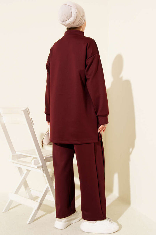 طقم غوص من قطعتين باللون العنابي مع جيب صدر بغطاء وسحاب