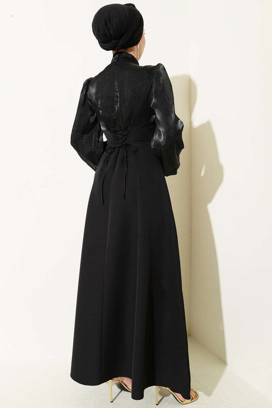 Black Evening Dress with Balloon Sleeves and Gold Accessories