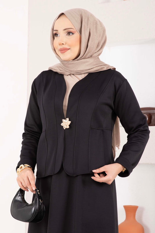 Black Jacket and Skirt Two-Piece Set with Gold Brooch