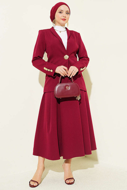 Ensemble jupe et blazer bordeaux à boutons dorés