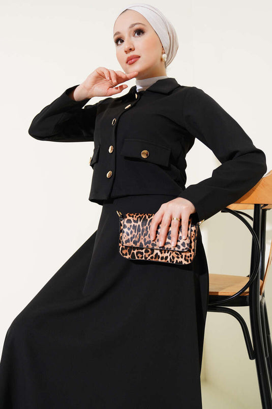 Costume deux pièces noir à jupe boutonnée dorée