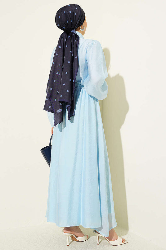 Ensemble avec jupe à volants et boutons dorés, bleu bébé