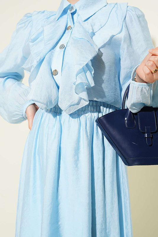 Ensemble avec jupe à volants et boutons dorés, bleu bébé