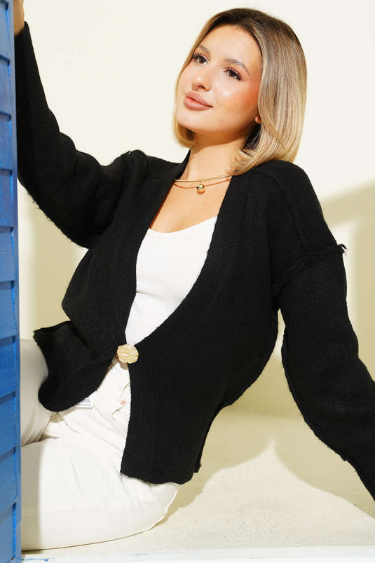 كارديجان أسود محبوك بغرزة معكوسة وأزرار ذهبية