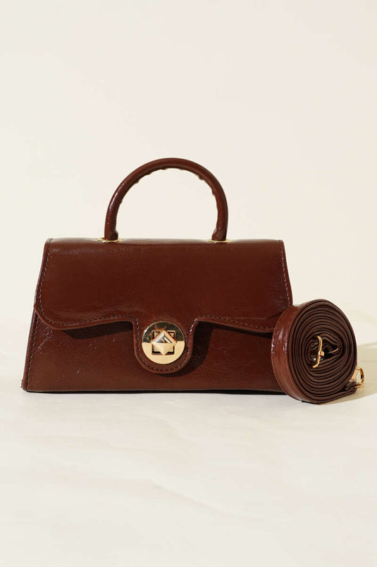 Sac en cuir verni marron avec fermoir doré