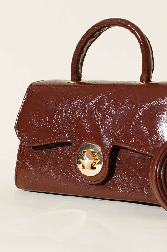 Sac en cuir verni marron avec fermoir doré
