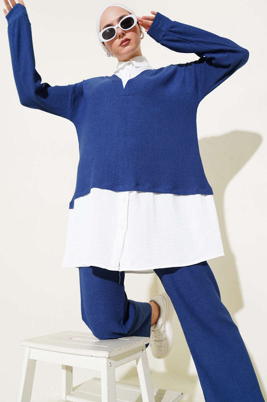 Costume deux pièces bleu marine avec chemise et tunique en crêpe garnie