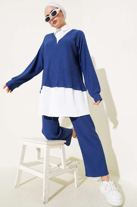 Costume deux pièces bleu marine avec chemise et tunique en crêpe garnie