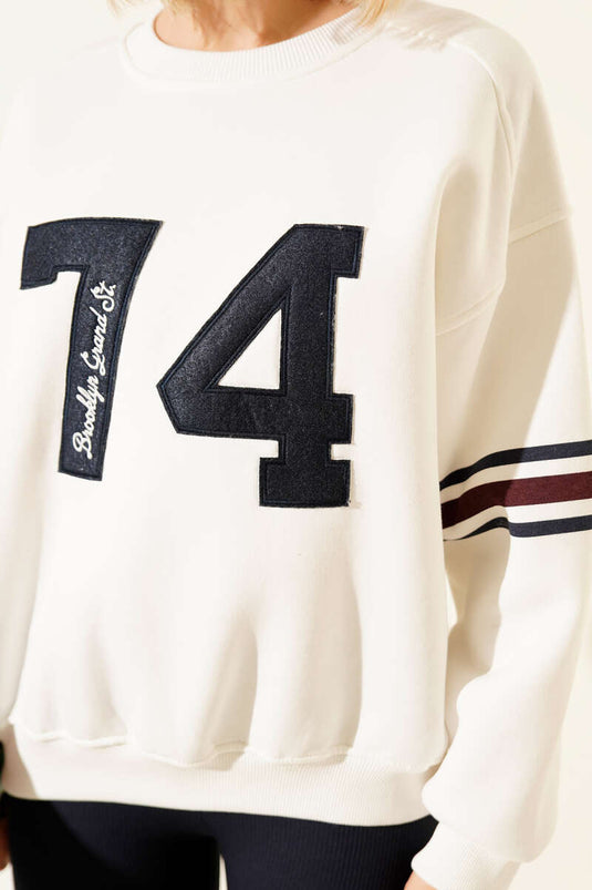 سويت شيرت مطرز كبير، لون بيج فاتح