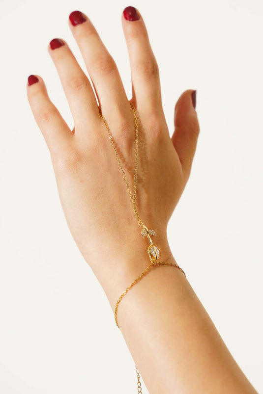 Roosvormige steen versierd met Shahmaran-goud