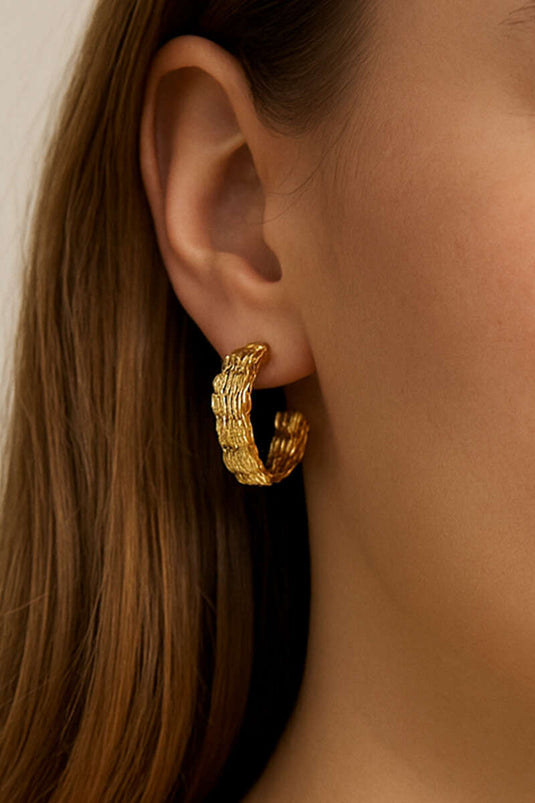 Dikke geweven oorringen in goud