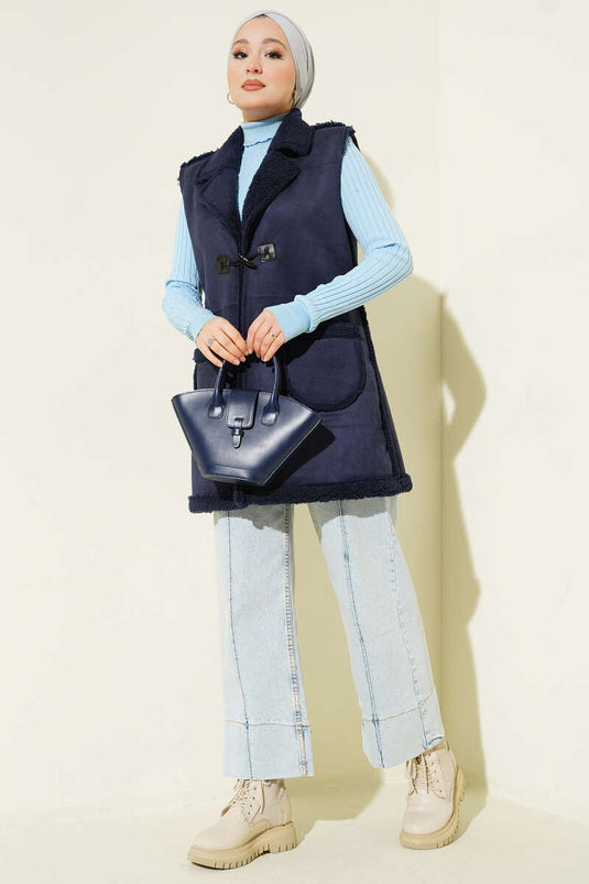 Gilet en daim bleu marine avec doublure en fourrure et poches