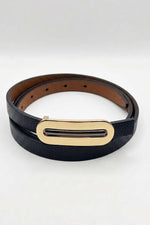 Ceinture fine noire avec boucle ovale dorée
