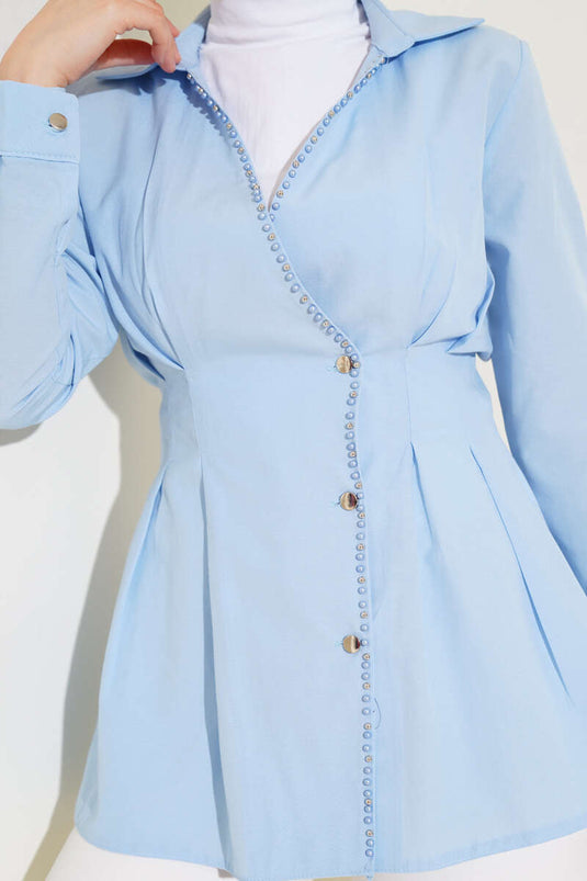 Chemise plissée à taille détaillée avec perles bleues
