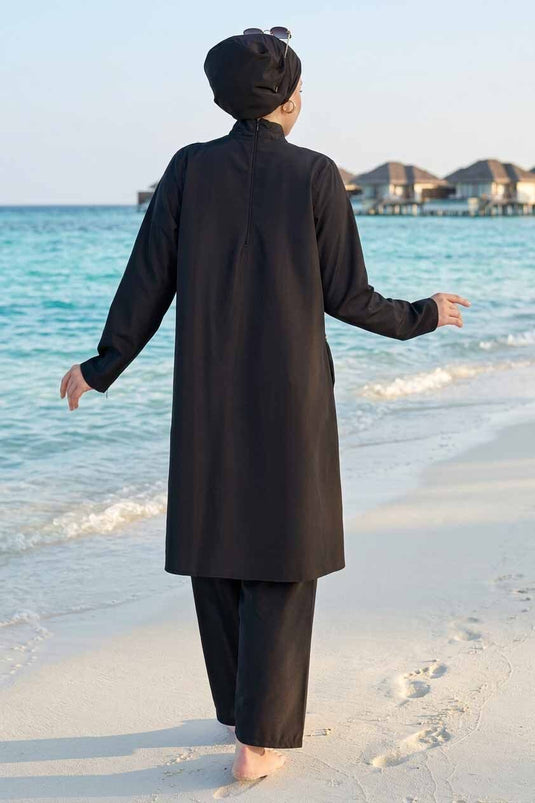 مايوه محتشم ثلاثي بتفاصيل كشكش وخرز أسود