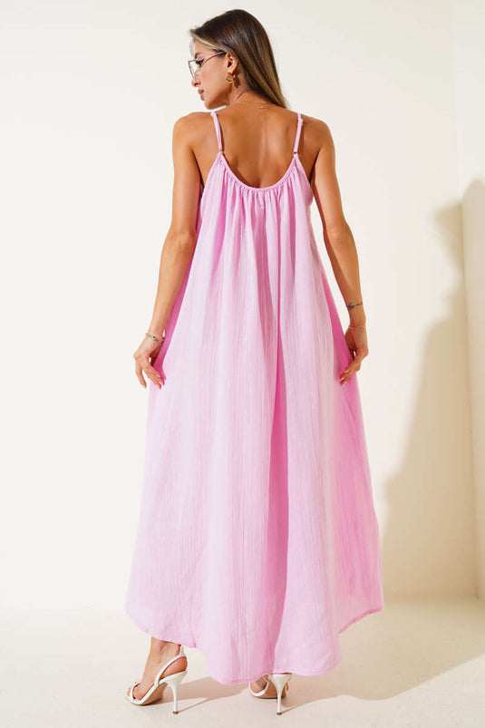 Loose-fitting muslin dress with thin straps, pink.