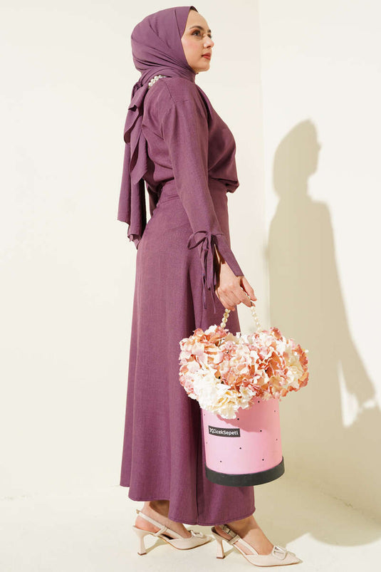 Ensemble deux pièces basique violet avec jupe à nouer.