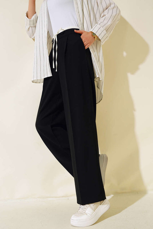 Pantalon à cordon noir