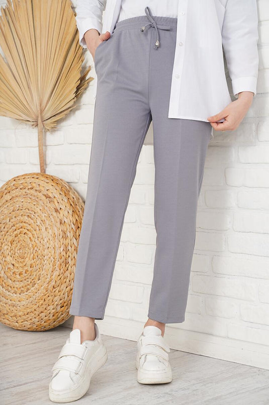 Pantalon gris à jambe slim et détails en corde avec taille élastique