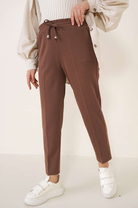 Pantalon marron à jambe slim et détail en corde avec taille élastique