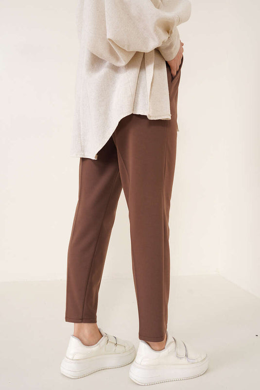 Pantalon marron à jambe slim et détail en corde avec taille élastique