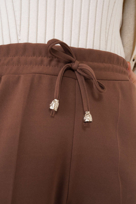 Pantalon marron à jambe slim et détail en corde avec taille élastique