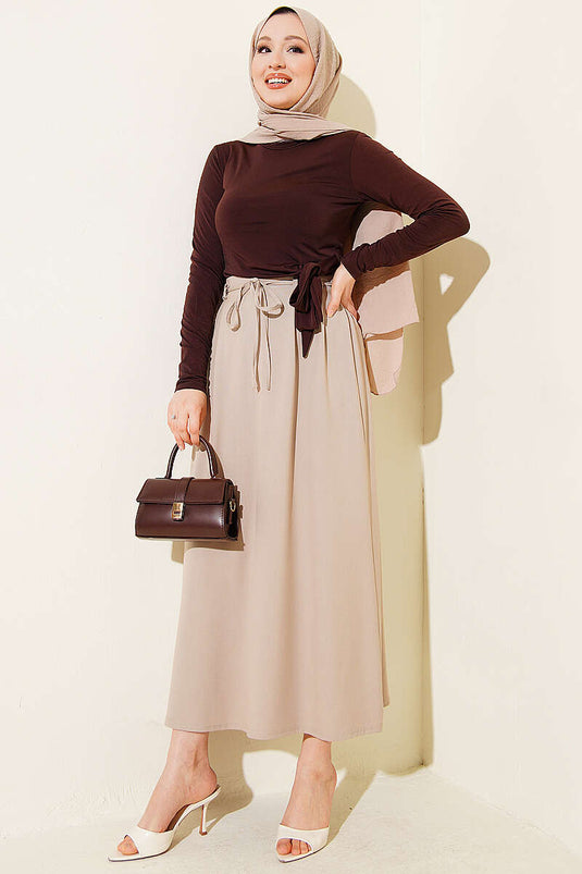 Jupe beige à double pince avec ceinture en corde