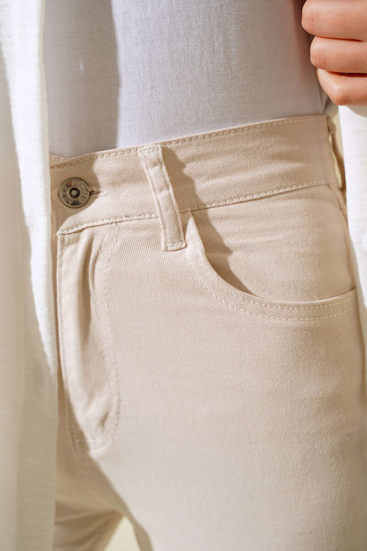 Pantalon en jean beige taille haute à jambe évasée