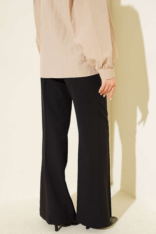Pantalon noir espagnol à jambes larges avec ceinture