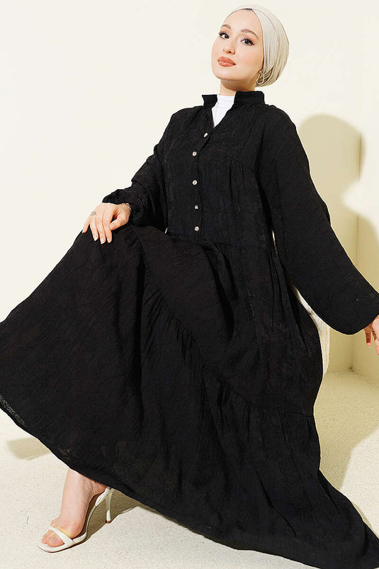 Robe longue boutonnée à motif en relief noire
