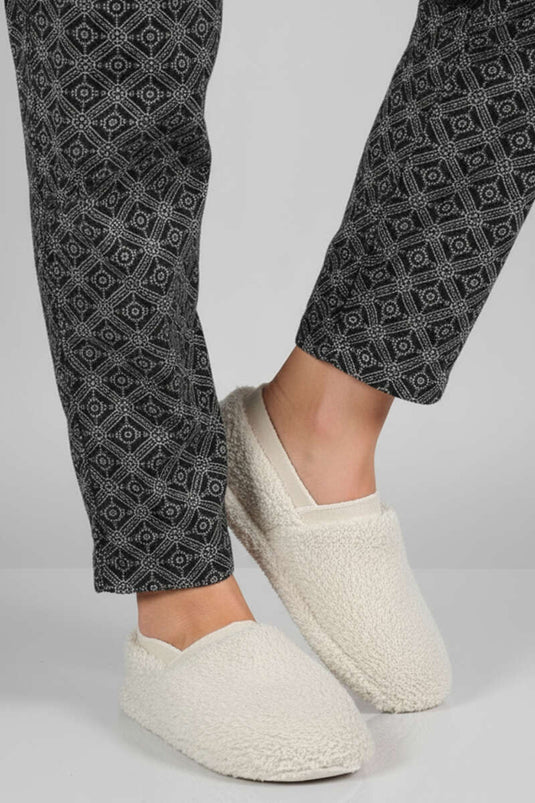 Pantoufles souples beiges pour femmes