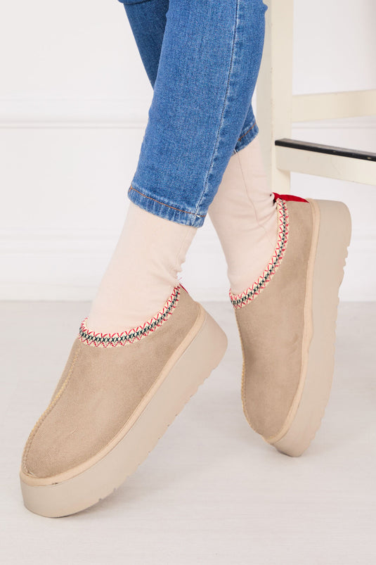 Bottes courtes en fourrure beige à semelle épaisse