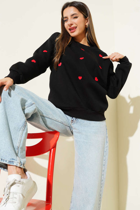 Sweat-shirt noir brodé d'un cœur