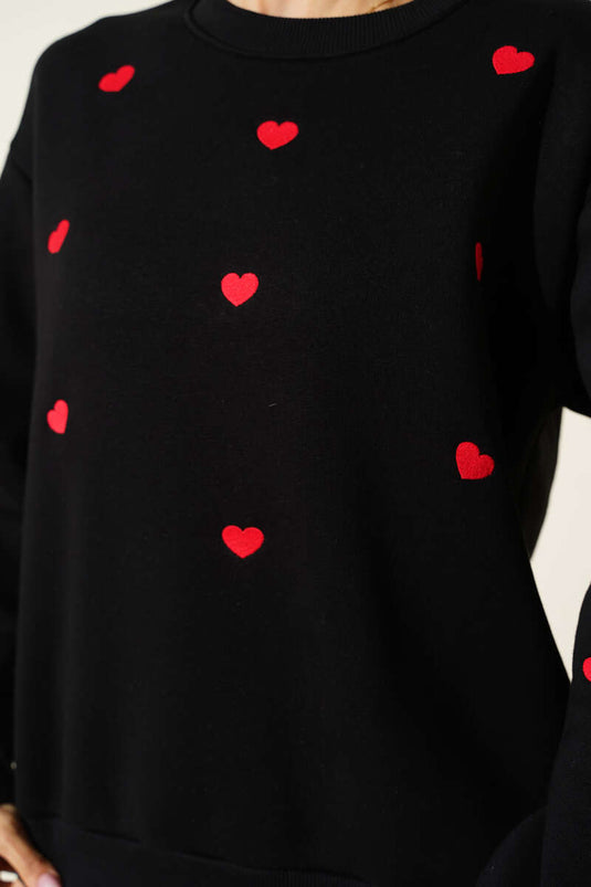 Sweat-shirt noir brodé d'un cœur