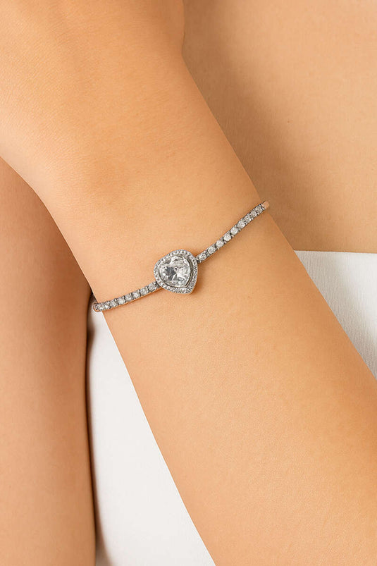 Hartvormige zilveren armband met waterstenen
