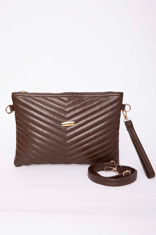 Pochette matelassée à fermeture éclair motif marron