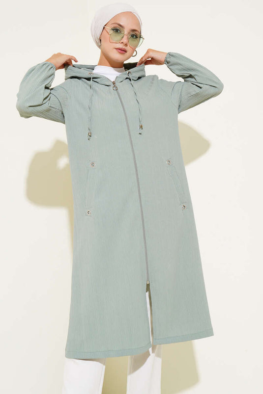 معطف من لحاء الشجر بجيب بغطاء للرأس باللون الأخضر اللوزي