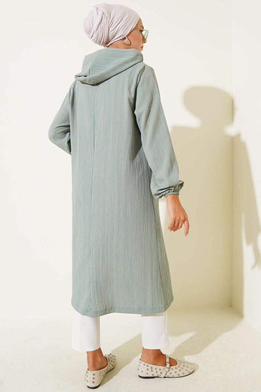 معطف من لحاء الشجر بجيب بغطاء للرأس باللون الأخضر اللوزي