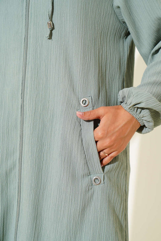 معطف من لحاء الشجر بجيب بغطاء للرأس باللون الأخضر اللوزي