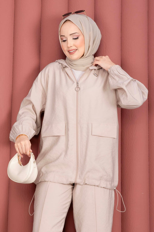 Ensemble décontracté deux pièces beige avec capuche et fermeture éclair