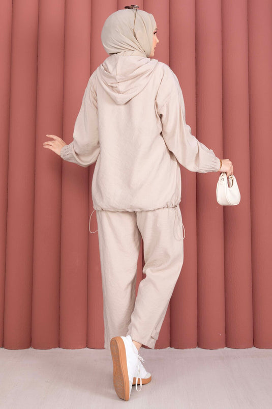 Ensemble décontracté deux pièces beige avec capuche et fermeture éclair