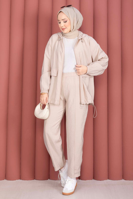 Ensemble décontracté deux pièces beige avec capuche et fermeture éclair